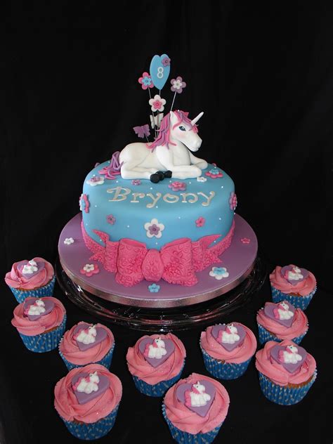 Unicorn Fondant Cake With Cupcakes - CakeCentral.com