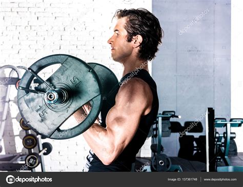 Man Exercising In Gym — Stock Photo © Dimagavrish 137361748
