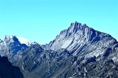 Kinabalu national park, a unesco world heritage site in sabah, malaysia, is home to one of the tallest mountains in southeast asia. 5075428