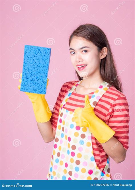 Asian Beautiful Woman Holding A Sponge To Clean The Device And Smiling