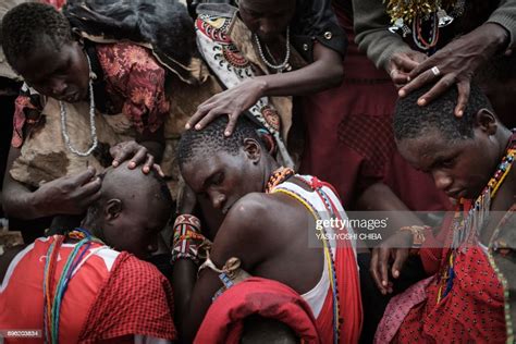 The Hair Of Circumcised Maasai Young Men Are Shaved By Their Mother