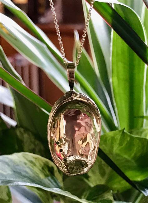 Maybe you would like to learn more about one of these? Handcrafted, like all our jewelry, solid 14k gold abalone ...