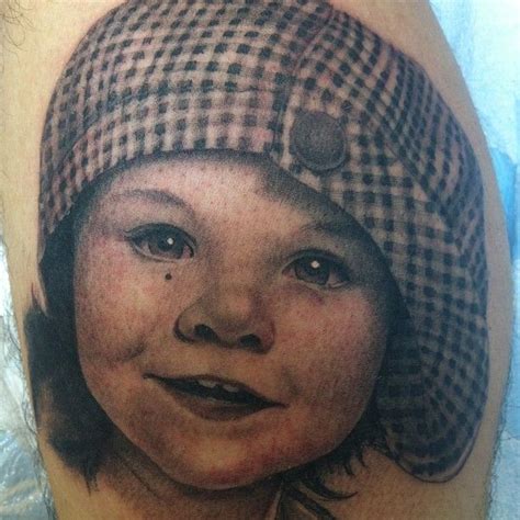 He began tattooing at the age of 15. Kid tattoo by Corey Miller