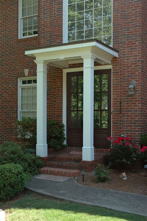 Precisely crafted to fit a majority of exterior entryways, the flat roof porch canopy is a fantastic product that is constructed from beautiful pine which is durable & unfinished, meaning that as long as it is lightly sanded it can. Flat roof portico designed and built by Georgia Front ...