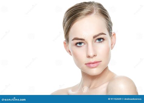 Pretty Girl With Blue Eyes And Blond Hair With Naked Shoulders
