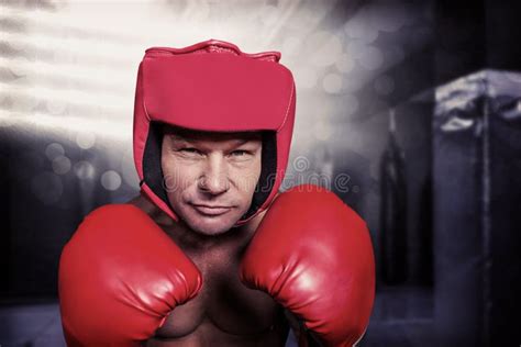 Composite Image Of Portrait Of Boxer With Gloves And Headgear Stock