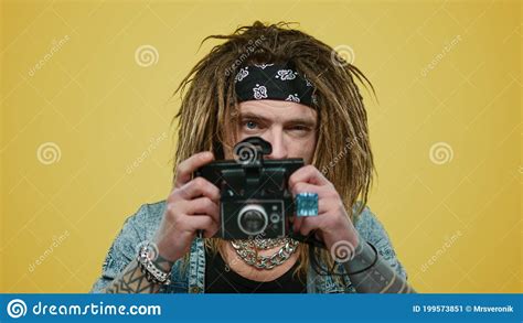 Man Taking Picture On Old Photo Camera Smiling Guy Posing At Camera In
