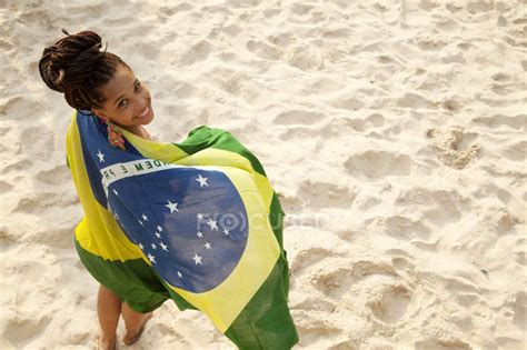 Overhead Portrait Of Young Woman Wrapped In Brazilian Flag Ipanema
