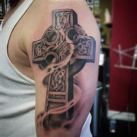 This back tattoo has the celtic falcon design as a focal point. 100 Celtic Cross Tattoos For Men - Ancient Symbol Design Ideas