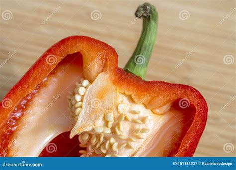 closeup of red bell pepper sliced in half seeds and juicy flesh stock image image of close