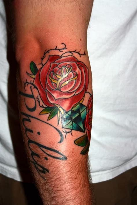 Rose On Elbow Elbow Tattoos Rose Elbow Tattoo Rose Tattoos For Men