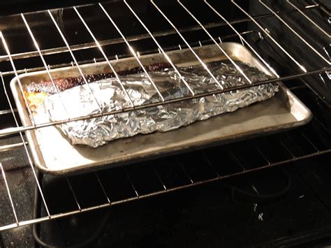 To test it is cooked, insert a metal skewer through the foil and into the centre of the. Beef Ribs Wrapped in Aluminum Foil in the Oven by Man Fuel ...