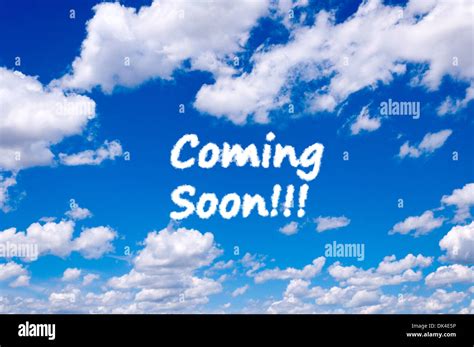 Coming Soon Sign Clouds On The Clear Blue Sky Stock Photo Alamy