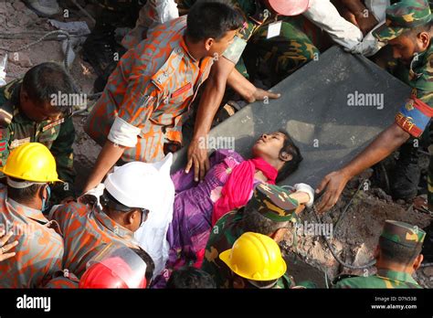 may 10 2013 savar dhaka bangladesh rescuers pull a woman called reshma from the rubble of