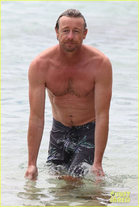 Simon Baker Looks Fit Going For A Dip In The Ocean Photo