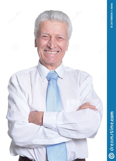 Close Up Portrait Of Senior Businessman In Formal Wear Posing Stock