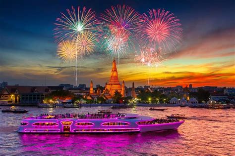 Fireworks At Wat Arun And Cruise Ship In Sunset Time Under New Year
