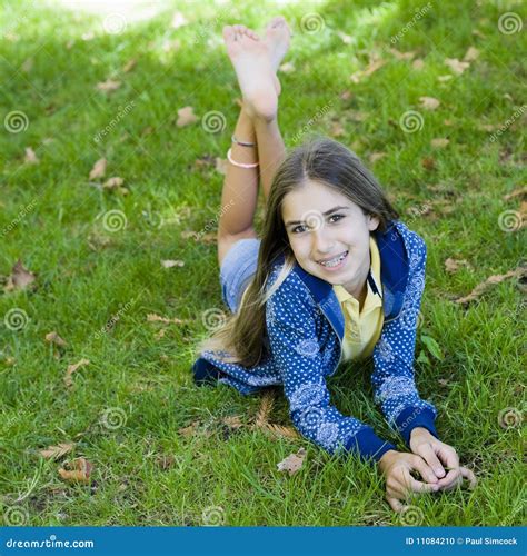 Portrait Of Smiling Tween Girl Stock Photo Image Of Grass Happy