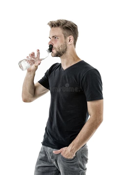 Feeling Thirsty Man Athlete Hold Water Bottle Guy Drink Water On White Background Man Care
