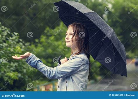 Wet Young Girl Walking In The Rain With Umbrella Stock Photo Image