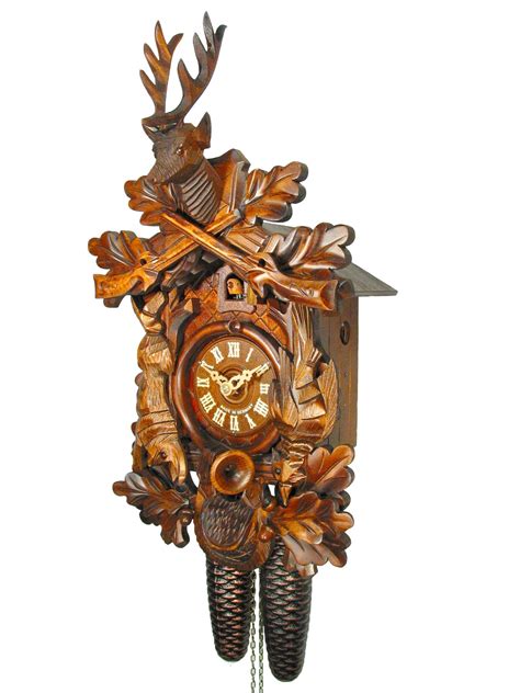 Carved 8 Day Hunting Style Cuckoo Clock With Hanging Hare And Pheasant