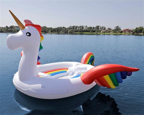 Joyin inflatable unicorn pool float with glitters, fun beach floaties, ride on unicorn raft, pool toys, summer party lounge raft decorations for kids (69 x 29.5 x 33.5). Giant Party Island Unicorn Float