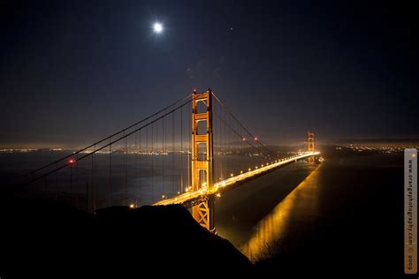 Golden Gate Bridge Photographed At Night With Jupiter And
