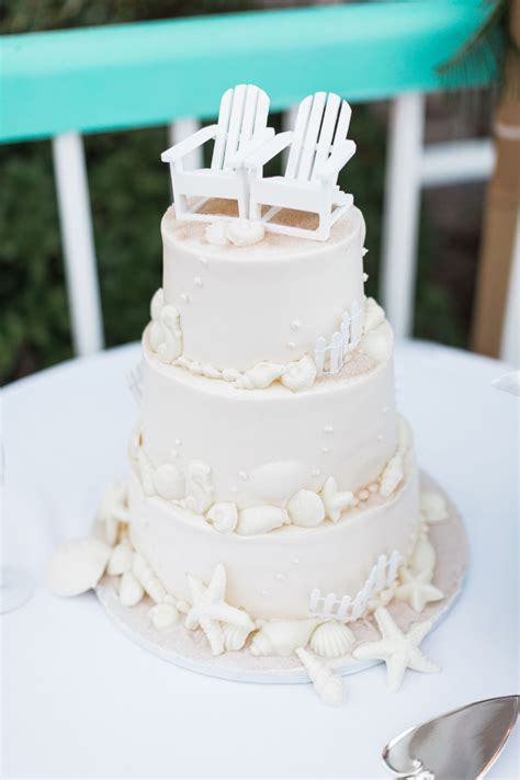 Elegant beach themed white butter cream wedding cake with. Beach Wedding Cake Ideas - Destination Wedding Details