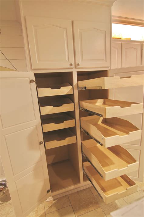 Replace the boxes which do not match the storage containers and place fitting similar elements in containers or baskets to quickly tame the. Space Efficient Custom Pull-Out Pantry Shelves | Pantry ...