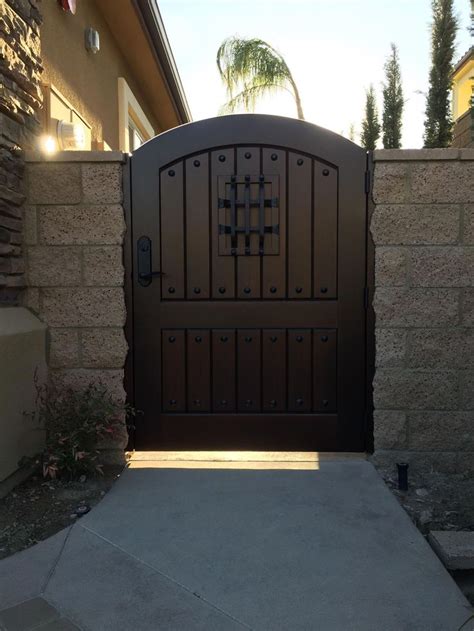 Custom Wood Gate With Decorative Grill By Garden Passages Tuscanstyle