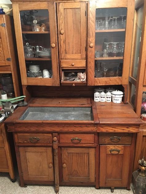 Wood bros old charm cabinet solid tudor oak in good condition. In excellent condition table slides out from dry sink right bottom is I think flour bin ...