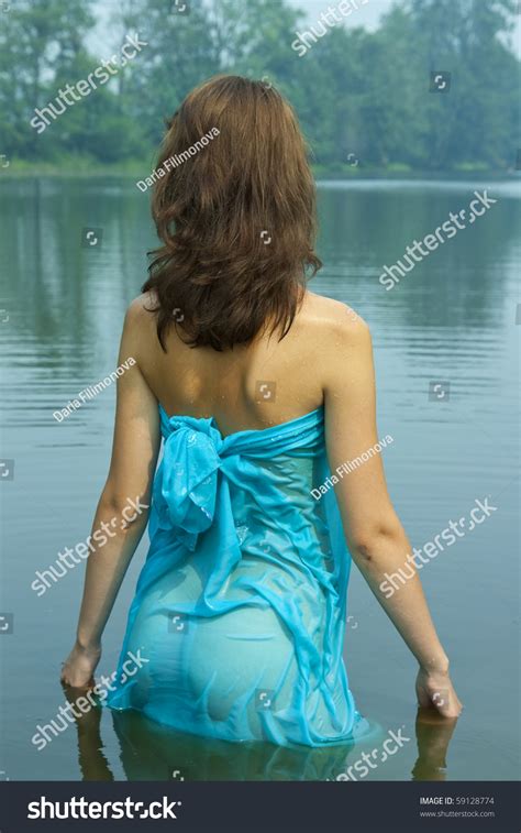 sexy girl blue wet dress lake foto stok 59128774 shutterstock