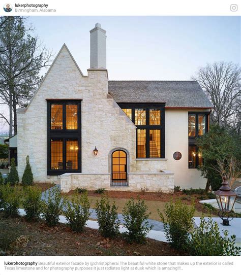 Black and white house exterior with stone. black windows with white body | House exterior ...
