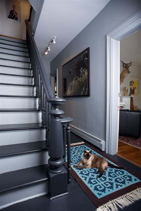 Maybe it's when you're looking through your teenager's how to paint wood steps with white risers and black treads, white spindles and black banister. In the Hudson Valley, Room for Work and Play | Painted ...