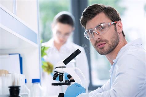 Male Scientist During Work At Modern Biological Laboratory Stock Image