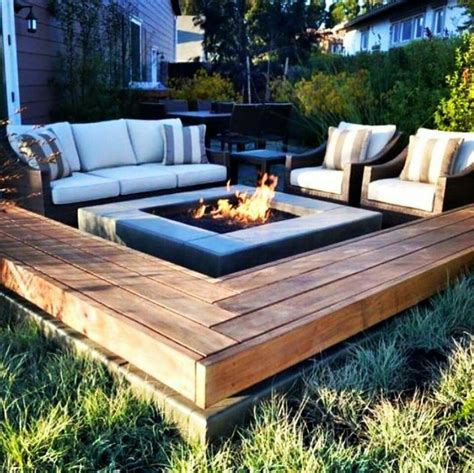 This is a fire pit that you build into the ground but it's really important that you have a lid for these types of pits. Fire pit with built in retainer wall come bench seat ...