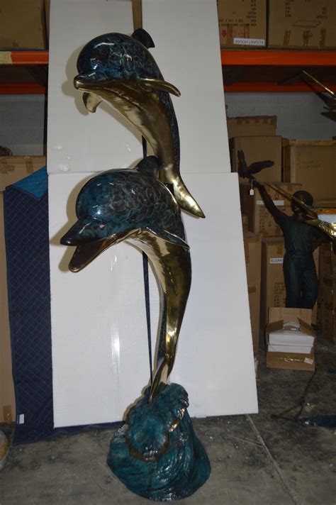 Two Dolphins Overreach Others On Waves Bronze Statue 44l X 23w X 76