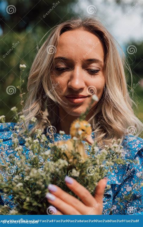Beautiful Girl Holding Wildflowers And Duckling In Her Hands Stock Image Image Of June