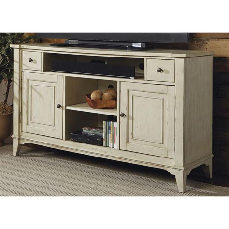 Add an element of farmhouse charm to any entertaining space with the member's mark charlotte console. Liberty Harbor Rustic Ivory Distressed Transitional TV ...