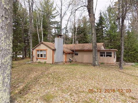 The tongue and groove cedar walls and vaulted ceiling anchored by the beautiful stone fireplace in the center of the. 11728 Tracey Ln, Crivitz, WI Up North Cabin near Crooked ...