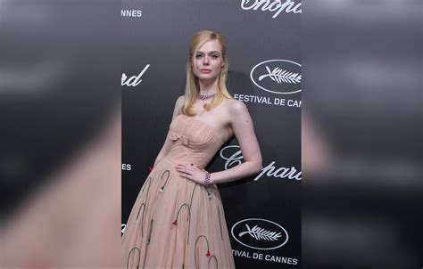 Elle Fanning Wears Loose Dress After Fainting In Cannes