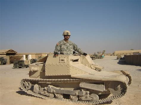 An Italian Wwii Cv33 Tankette In Iraq Occupied By A Us Army Soldier