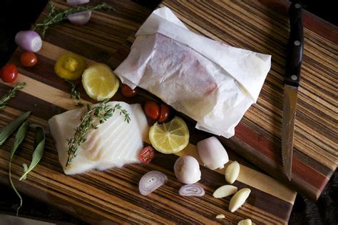 Brush with olive oil and season with salt and pepper to taste. Parchment Baked Halibut | Recipe | How to cook fish ...