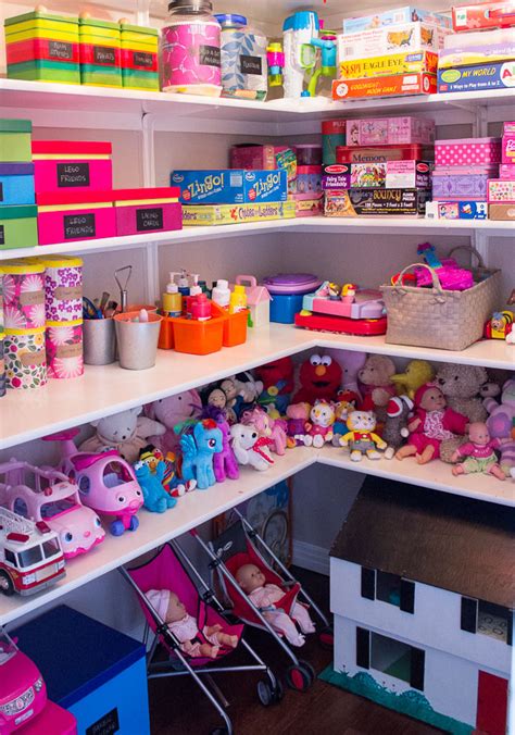 Here are kids playroom storage and organization ideas, with pictures, shared by readers, showing how they organized the toys and other items in this in week #46 of the organized home challenge we tackled toy organization, and this room would definitely count as part of working on that process. Kids toy storage ideas - Wendy Peterson