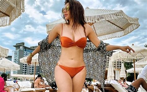 sexaholic star shama sikander shares pics in red bikini flaunts her hot body while holidaying