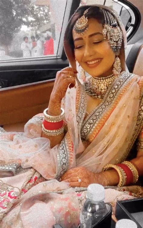 Image Neha Kakkar Accessorised Her Bridal Look With Red Choodas Photo