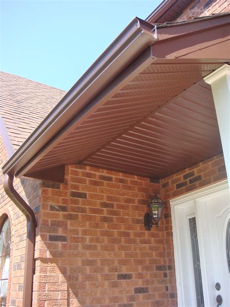 Aluminum Soffit Fascia And Trough With Cocoa Vinyl Board And Batten