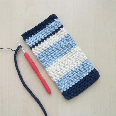 Includes a card slot, phone stand and hand grip. Crossbody cell phone case Blue Knit phone case Cute iphone ...