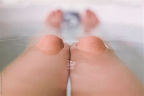 Women S Knees In Bath Water By Stocksy Contributor Holly Clark Stocksy