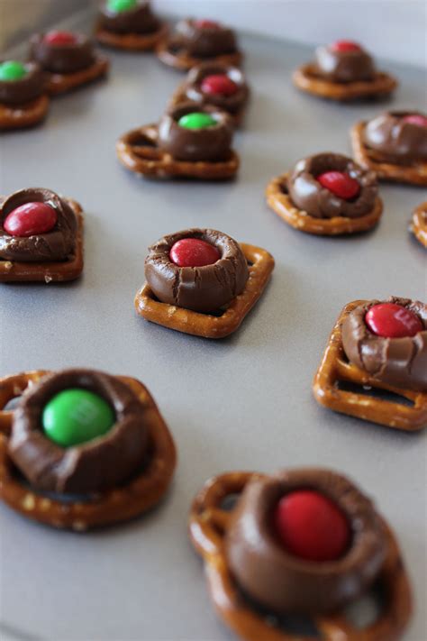 How to make an easy christmas sugar cookie recipe from scratch. Pretzels with Hershey Kisses - make Christmas themed ones ...